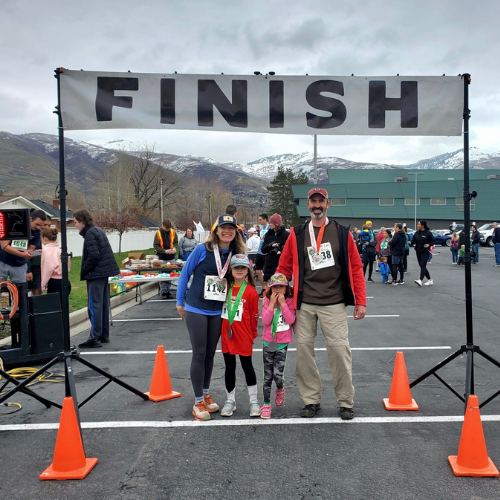 A family participates in the Recycle Run in Bountiful, Utah