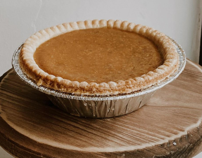 Pumpkin Pie on wooden stand